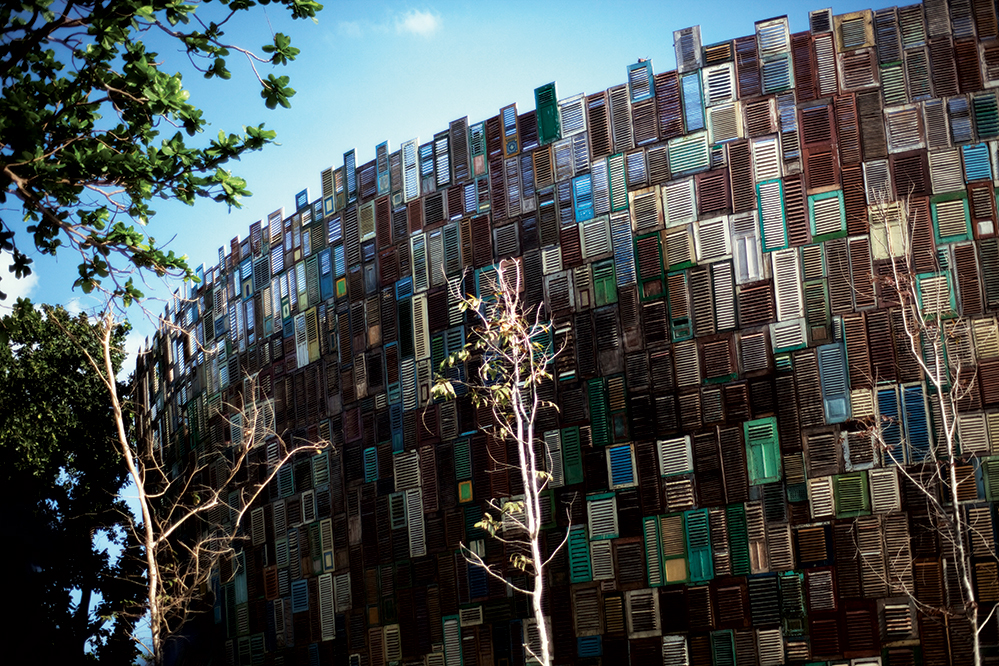 Potato Head Bali has a facade made from wooden shutters